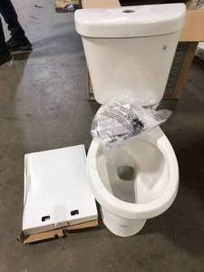 Glacier Bay 2-piece 1.1 GPF1.6 GPF Dual Flush Round Toilet in White, Seat Included Customer Returns See Pictures