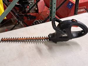 lot 31 image: Black & Decker 17-cut Electric Hedge Trimmer TR1700