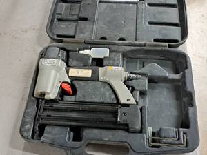 lot 113 image: Porter Cable 18-GA 34-2 Air Nailer with Case