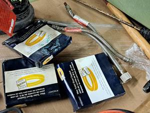 lot 146 image: Plumbing Parts (in original packaging) - (3) Wax Toilet Bowl Gaskets and (3) 38 Compression Thread Faucet Water Lines