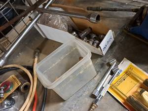 lot 175 image: Lot of  Misc. Tire Accessories - (2) Cross-Bar Lug Wrenches, Lug Nuts, Repair Kit, Air Hose Attachments