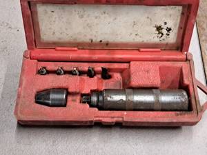 lot 228 image: Impact Driver with Bits and Red Plastic Case