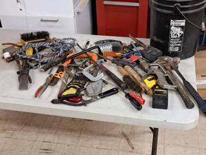 lot 251 image: Lot of (1 Bucket) Assorted Hand Tools - Hammers, Staplers, Pliers, Wrenches, Pry Bars, Clamps, Stud Finders, Brushes, Tire Iron, Scissors, and more