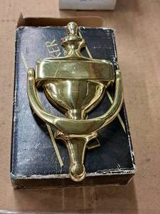 lot 450 image: Brass Door Knocker (in original packaging)