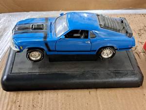 lot 468 image: Ford Mustang Boss 302 118 Scale Diescast Model Car with Stand