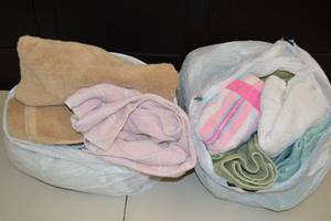 lot 16 image: Bulk Assorted Towels of Different Size, Color, and Pattern