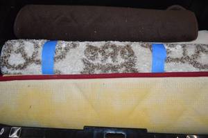lot 30 image: Bulk Assorted Rugs - Tub Not Included
