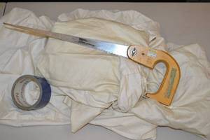 lot 32 image: Muslin Fabric, Hand Saw, Duct Tape