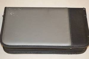 lot 33 image: DVD Case with Assorted DVDs and CDs