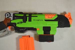 lot 112 image: Nerf Zombie Strike Slingfire Blaster Spring Loaded. Lever Action, Fully Functional, Comes with Two 6-Round Magazines - Ammo Not Included