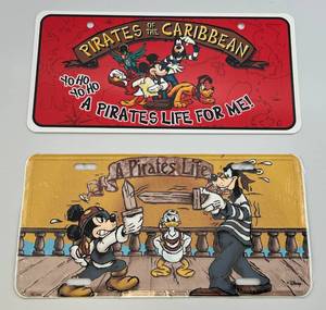 lot 127 image: Vintage Disney  Pirates Life (Factory Sealed) & Pirates Of The Caribbean License Plate (New In Sleeve)