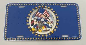 lot 130 image: Vintage Collectible Disneyland Bicentennial License Plate (New Factory Sealed In Plastic Sleeve)