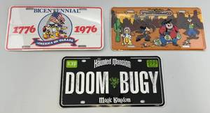 lot 134 image: Vintage Disney License Plates Including Bicentennial, Magic Kindom Frontierland (Both Factory Sealed) & The Haunted Mansion (NEW IN Sleeve)