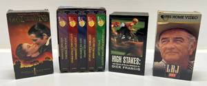 lot 138 image: Misc. Vintage Items Including VHS And Novel Set