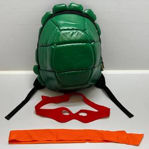 lot 148 image: Teenage Mutant Ninja Turtles Soft Shell Backpack With Face Mask & Head Band  (Never Used)