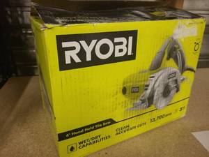 lot 2 image: Ryobi 4 Hand Held Tile Saw with WetDry Capabilities