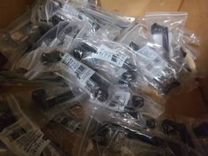 lot 57 image: Box of various hardware for cabinets and furniture
