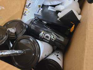 lot 147 image: Box of Graduation themed gifts and drinking cups