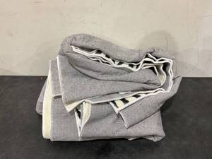 lot 172 image: Black and White Rug Measures 102 x 72
