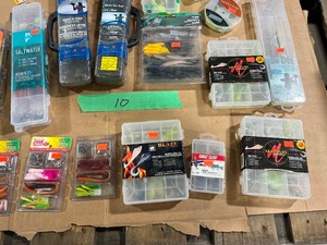 lot 10 image: TABLE FULL OF FISHING PLASTICS