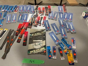 lot 134 image: TABLE FULL OF SAWZALL, JIGSAW, SCROLLSAW, & BAND SAW BLADES