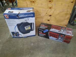 lot 85 image: Tool Shop 15-bin Storage Rack CH 50 Foot Retractable Hose Reel