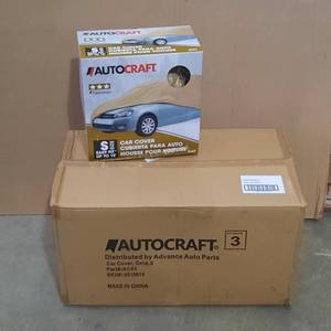lot 133 image: 1 Carton of  Auto Craft Car Covers, AC63, Gold, Size S fits up to 15 foot car. (4 covers per carton)