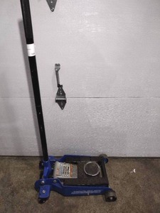 lot 144 image: Crewline 3000 lb. Triple Lift Garage Jack