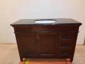 lot 206 image: Foremost Ashburn Vanity in Mahogany with oval sink,  48 W X 21.625 D X 35 H