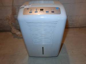 lot 215 image: GE 70 pint Dehumidifier, ADEL70LR