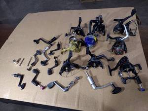 lot 248 image: Fishing reels and fishing reel parts.