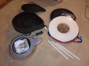 lot 313 image: Gardco Lighting TSR Fixture in black case. SPI Options Series Fixture in red case