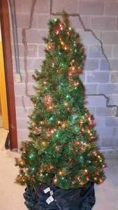 lot 355 image: 7 foot pre-lit Christmas tree with storage bag