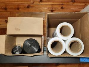 lot 369 image: (3) rolls stretch film 14.6 x however many feet are left on the rolls. Originally one roll held 1500 feet. Black plastic Trash Bags