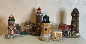 lot 26 image: Porcelain Lighthouse Lot of 4
