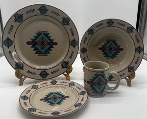 lot 91 image: SouthwestAztec Design Dinnerware large lot (four piece setting NIB)