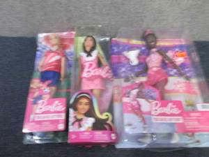 3 Barbie Dolls...