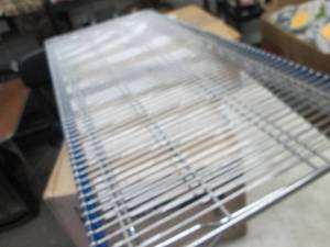 2- 48x21 inch Metal Shelf Racks...