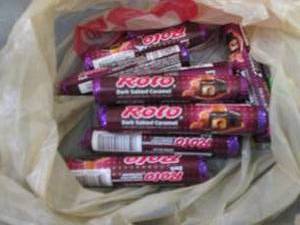 12- 1.7 oz Rolos Dark...