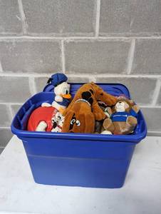 Bin of Pound Puppies and Other Plush Toys