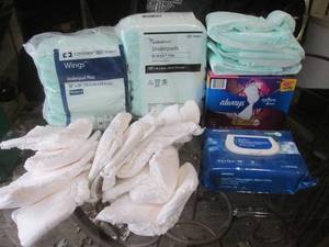 (G) Assorted Pads and Diapers...