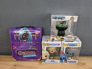 lot 32 image: New Funko Pop Elsa and Stitch with Plunger, Hello Sanrio Capsule Diorama, and BPack Luscious Locks Gal XE F