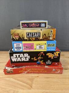 lot 117 image: Kirby Jigsaw Puzzle, Star Wars Tip It Game, Barnyard Gems Jigsaw Puzzle and More  F