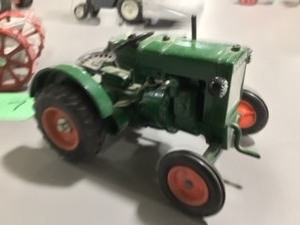A pair of 116 scale (i believe) tractors