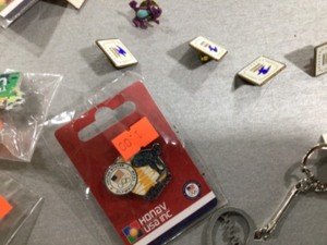OLYMPIC PIN SET ALONG WITH A BOX OF OTHER PINS. THE BOX HAS A  VARIETY OTHER OLYMPIC PINS AS WELL