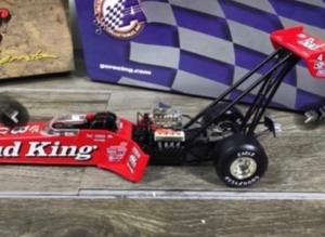 lot 55 image: 1999 NHRA Action Racing Collectibles Kenny Bernstein  Budweiser 20th Anniversary 124 scale die cast Top Fuel Dragster