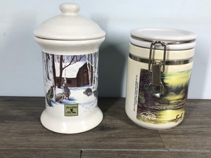 lot 73 image: 2 Canisters - Field & Stream & Terry Redlin