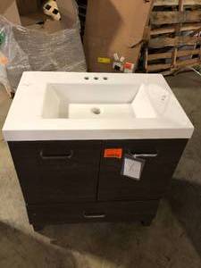 lot 18 image: Glacier Bay Bannister 24 in. W x 19 in. D x 35 in. H Single Sink Bath Vanity in Deep Blue with White Cultured Marble Top    Customer Returns See Pictures