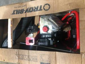 Troy-Bilt Storm 24 in. 208 cc Two- Stage Gas Snow Blower with Electric Start Self Propelled  Customer Returns See Pictures