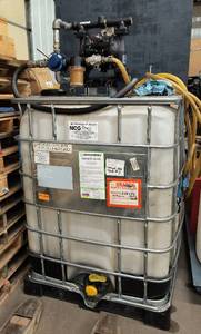 300 Gallon poly tank with nice Graco Husky 1050 transfer pump